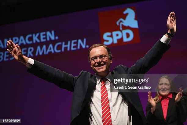 Stephan Weil, Mayor of Hanover and gubernatorial candidate of the German Social Democrats in elections in Lower Saxony, waves at the conclusion of an...