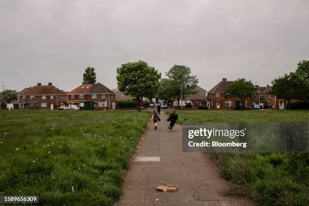 Children along a path in a residential area of Dormanstown in Redcar, Teeside, UK, on Wednesday, May 17, 2023. While the UK isn't alone among western...