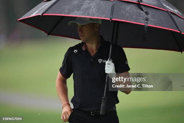 Justin Thomas of the United States walks to the 10th green during the first round of the Wyndham Championship at Sedgefield Country Club on August...