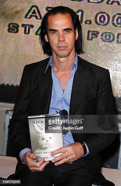 Nick Cave Autographs His Book 'The Death Of Bunny Munro' At Hmv On Oxford Street, London.