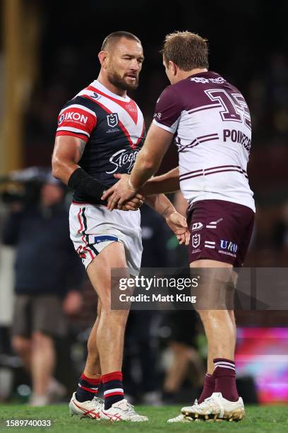 Jared Waerea-Hargreaves of the Roosters shakes hands with Jake Trbojevic of the Sea Eagles at full time during the round 23 NRL match between the...