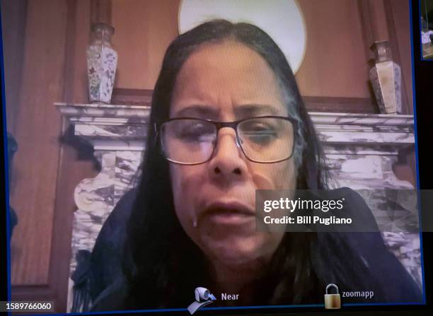 Seen on a television screen, Mayra Rodriguez is arraigned via Zoom in Ingham County District Court on August 10, 2023 in Lansing, Michigan. Rodriguez...