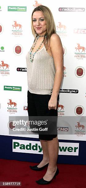 Cassie Powney Attends The Paddy Power Football Furlong Day At Haydock Park Racecourse In Merseyside.