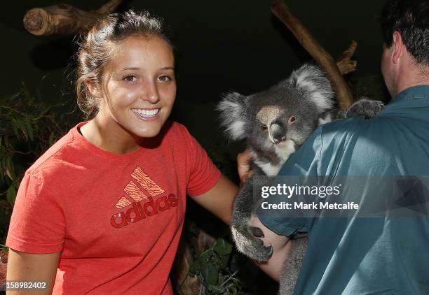 Laura Robson of Great Britain poses with a Koala on a visit to Bonorong Wildlife Sanctuary during day two of the Hobart International at Domain...