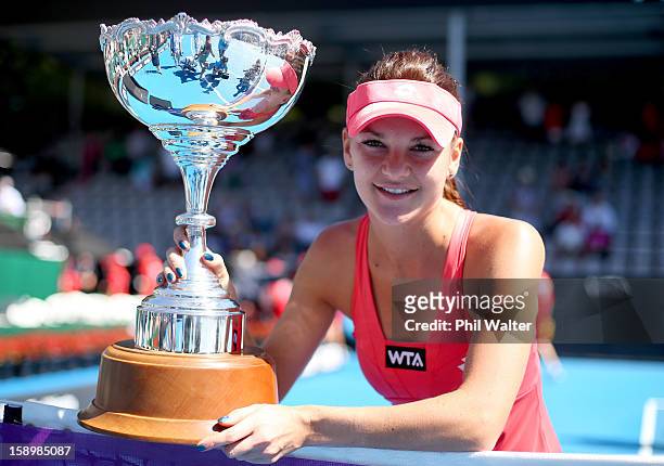 Agnieszka Radwanska of Poland holds the trophy following the final against Yanina Wickmayer of Belgium during day six of the 2013 ASB Classic at ASB...