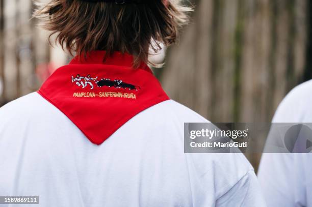 person with red neckerchief during san fermin - stierenrennen stockfoto's en -beelden