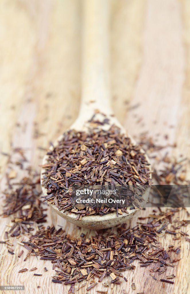 Rooibos tea on a wooden spoon