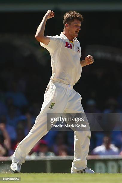 Jackson Bird of Australia celebrates taking the wicket of Dimuth Karunaratne of Sri Lanka during day three of the Third Test match between Australia...