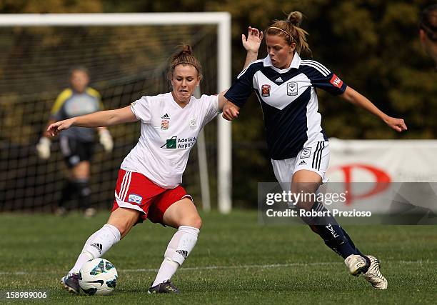 Sarah McLaughlin of Adelaide kicks the ball during the round 11 W-League match between the Melbourne Victory and Adelaide United at Wembley Park on...