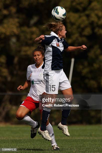 Amy Jackson of the Victory heads the ball during the round 11 W-League match between the Melbourne Victory and Adelaide United at Wembley Park on...