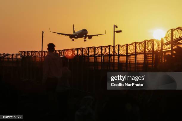 Commercial airplane makes approach to land at I Gusti Ngurah Rai International Airport in Kuta, Bali, Indonesia on August 10, 2023. The number of...