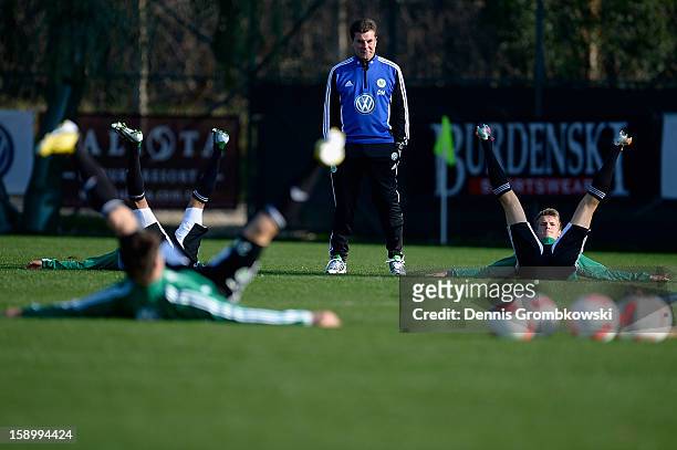 Head coach Dieter Hecking of Wolfsburg watches his team during a training session at day two of their Training Camp on January 5, 2013 in Belek,...