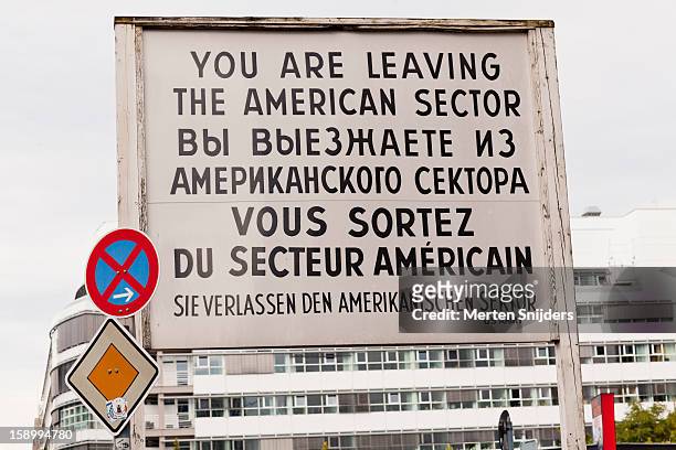 historic sign at checkpoint charlie - checkpoint charlie stock pictures, royalty-free photos & images