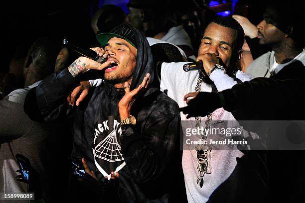 Chris Brown and The Game perform at the DGK Agenda after party at Cafe Sevilla on January 4, 2013 in Long Beach, California.