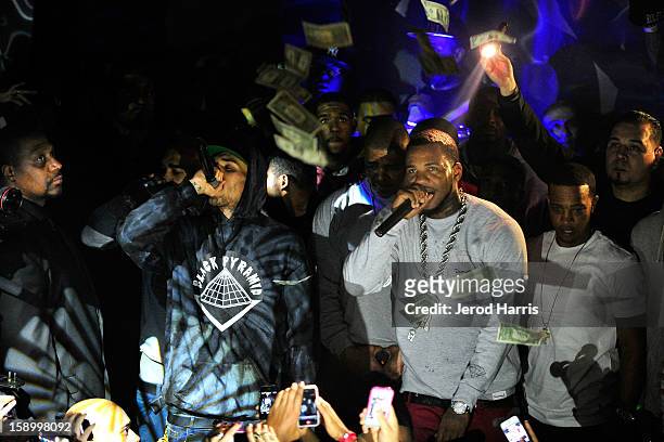Chris Brown and The Game perform at the DGK Agenda after party at Cafe Sevilla on January 4, 2013 in Long Beach, California.