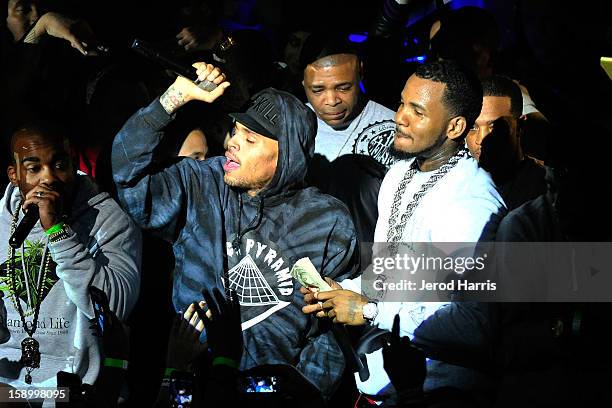 Chris Brown and The Game perform at the DGK Agenda after party at Cafe Sevilla on January 4, 2013 in Long Beach, California.