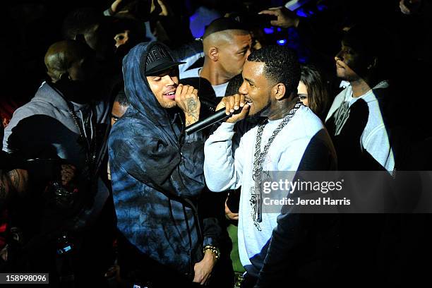 Chris Brown and The Game perform at the DGK Agenda after party at Cafe Sevilla on January 4, 2013 in Long Beach, California.