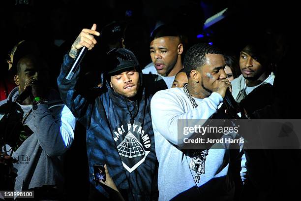 Chris Brown and The Game perform at the DGK Agenda after party at Cafe Sevilla on January 4, 2013 in Long Beach, California.