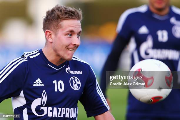 Lewis Holtby focusses on the ball during a Schalke 04 training session at the ASPIRE Academy for Sports Excellence on January 5, 2013 in Doha, Qatar.