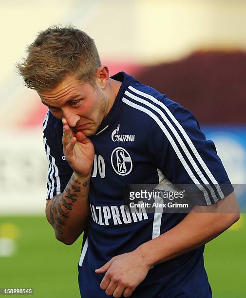 Lewis Holtby reacts during a Schalke 04 training session at the ASPIRE Academy for Sports Excellence on January 5, 2013 in Doha, Qatar.
