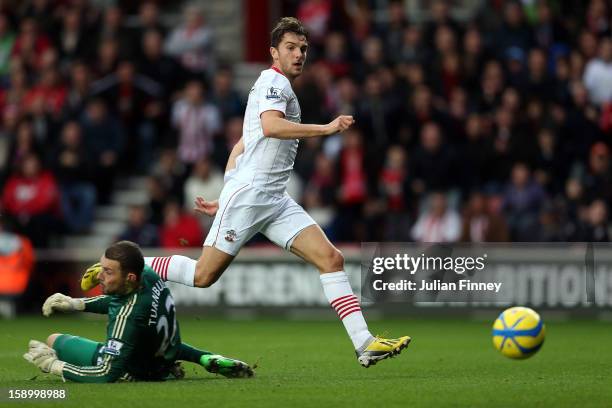 Jay Rodriguez of Southampton scores the first goal past Ross Turnbull of Chelsea during the FA Cup Third Round match between Southampton and Chelsea...