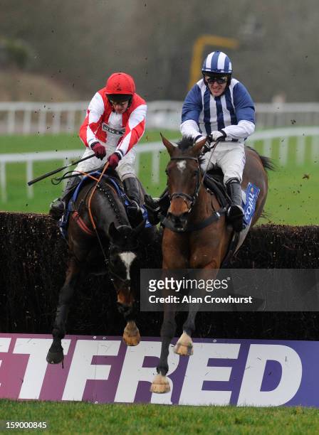 Paul Carberry riding Monbeg Dude clear the last to win The Coral Welsh National from Teaforthree and Tony McCoy at Chepstow racecourse on January 05,...