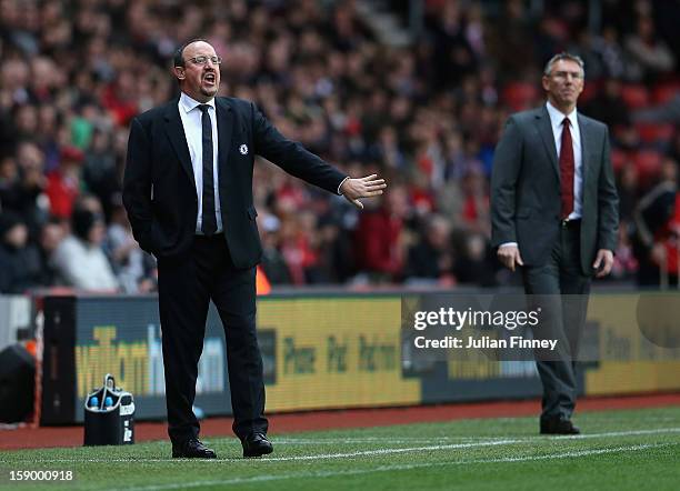 Rafael Benitez, manager of Chelsea gives instructions as Nigel Adkins, manager of Southampton looks on during the FA Cup Third Round match between...