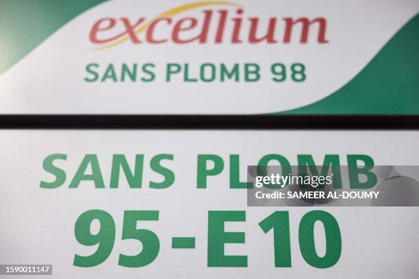 This photograph taken on August 10 shows a sign for SP95 and SP98 unleaded fuel at a Total Energies petrol station in Faches-Thumesnil near Lille,...