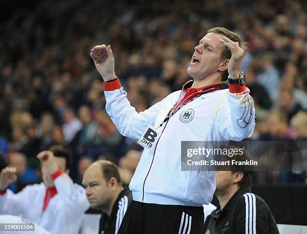 Martin Heuberger, head coach of Germany reacts during the international handball friendly match between Germany and Sweden at O2 World on January 5,...