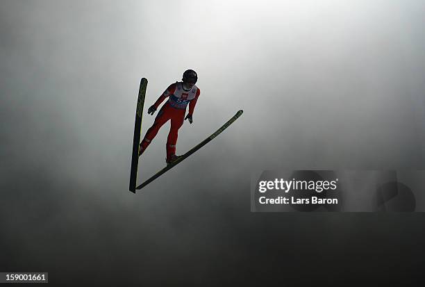 Tom Hilde of Norway competes during the qualification round for the FIS Ski Jumping World Cup event of the 61st Four Hills ski jumping tournament at...