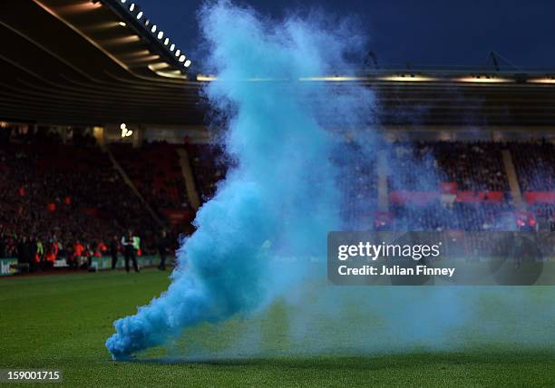 Chelsea fans let off smoke during the FA Cup Third Round match between Southampton and Chelsea at St Mary's Stadium on January 5, 2013 in...