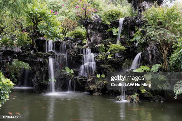 chinese classical garden landscape waterfall - guandong stock pictures, royalty-free photos & images