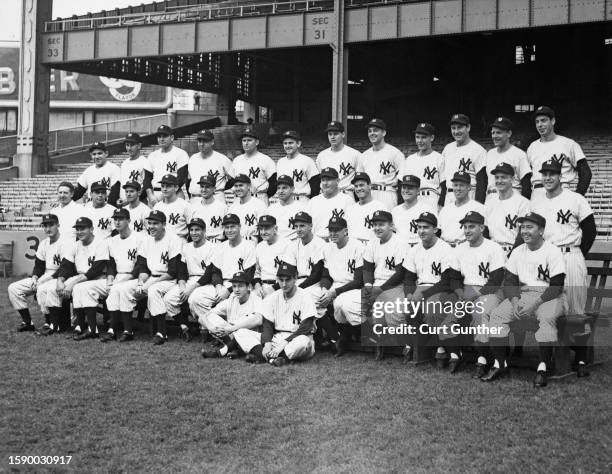 Back row, left to right: Yogi Berra, Tommy Byrne, Cliff Maples, Hugh Casey, Spec Shea, Charlie Silvera, Fenton Mole, Cuddles Marshall, Jim Delsing,...