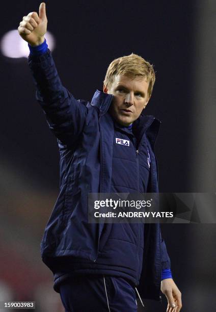 Bournemouth's manager Eddie Howe applauds the fans after a 1-1 draw during the English FA Cup third round football match between Wigan Athletic and...