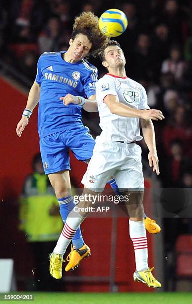 Chelsea's Brazilian defender David Luiz and Southampton's English striker Jay Rodriguez vie for a high ball during the English FA Cup third round...