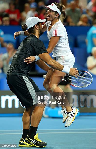 Fernando Verdasco and Anabel Medina Garrigues of Spain celebrate after defeating Novak Djokovic and Ana Ivanovic of Serbia in the mixed doubles final...