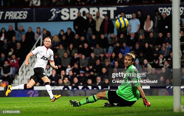 Tom Cleverley of Manchester United scores the opening goal past Jussi Jaaskelainen of West Ham United during the FA Cup with Budweiser Third Round...