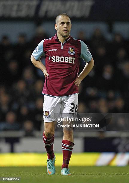 West Ham United's new signing, English midfielder Joe Cole looks on during the English FA Cup third round football match between West Ham United and...