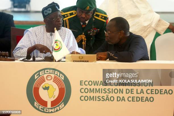 Chairperson of Economic Community of West African States and President of Nigeria, Bola Ahmed Tinubu interacts with President of ECOWAS Commission...