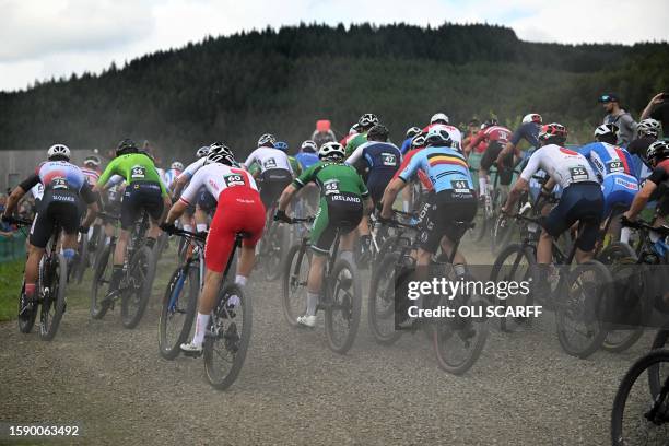 Riders take part in the men's elite mountain bike cross-country short track race at the Cycling World Championships in Glentress Forest, Scotland on...
