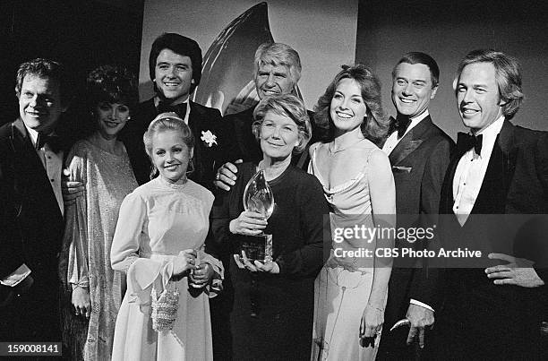 The Cast of "Dallas" after the 1980 People's Choice Awards. From left back row: Ken Kercheval, Victoria Principal, Patrick Duffy, Jim Davis, Linda...