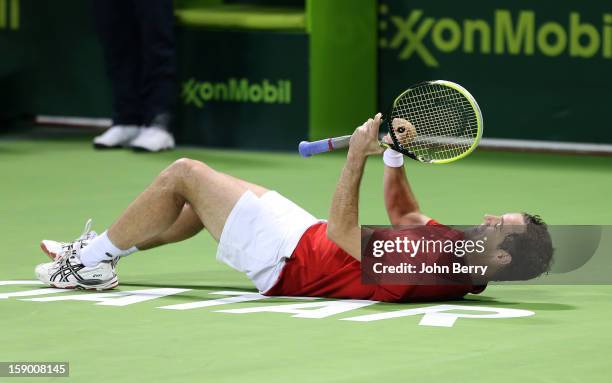 Richard Gasquet of France celebrates his victory after his final against Nikolay Davydenko of Russia in day six of the Qatar Open 2013 at the Khalifa...