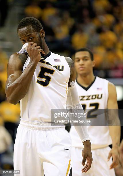 Keion Bell of the Missouri Tigers wipes his brow during the game against the Bucknell Bison at Mizzou Arena on January 5, 2013 in Columbia, Missouri.