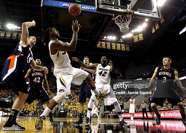Earnest Ross of the Missouri Tigers grabs a rebound during the game against the Bucknell Bison at Mizzou Arena on January 5, 2013 in Columbia,...