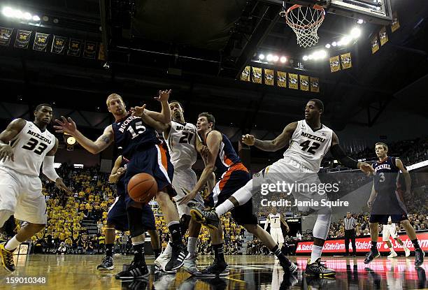 The Bucknell Bison compete against the Missouri Tigers for a loose ball during the game at Mizzou Arena on January 5, 2013 in Columbia, Missouri.