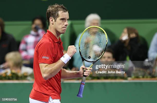 Richard Gasquet of France pumps his fist during the final against Nikolay Davydenko of Russia on day six of the Qatar Open 2013 at the Khalifa...