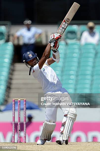 Sri Lankan batsman Dinesh Chandimal plays a shot on the fourth day of the third cricket Test match between Australia and Sri Lanka at the Sydney...