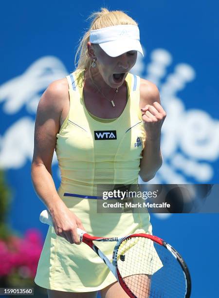 Olga Govortsova of Belarus celebrates victory in her first round match against Carla Suarez Navarro of Spain during day three of the Hobart...