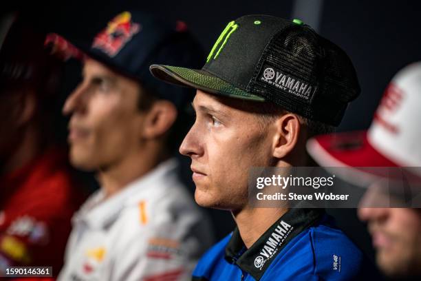 Fabio Quartararo of France and Monster Energy Yamaha MotoGP sits next to Marc Marquez of Spain and Repsol Honda Team at the press conference ahead of...