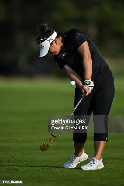S Megan Khang plays a second shot from the 18th fairway on the opening day of the 2023 Women's British Open Golf Championship at Walton Heath Golf...
